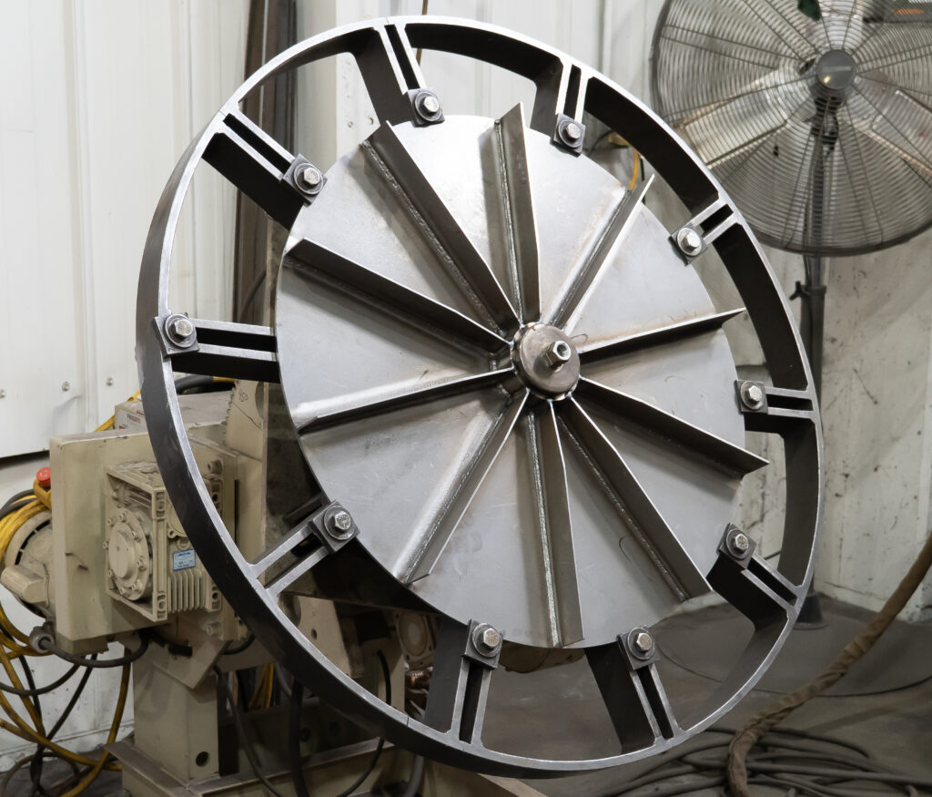 AirPro D model impeller moves from fabrication to wheel balancing in the shop.