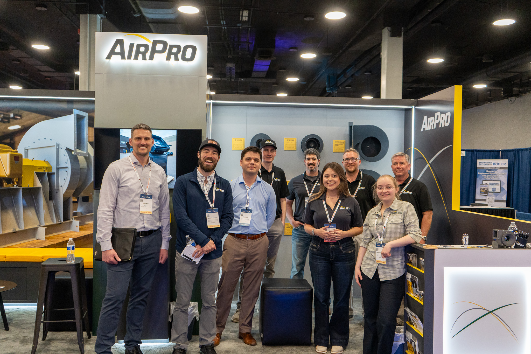 AirPro staff members posing in the trade show booth at ABMA Boiler Expo 2026